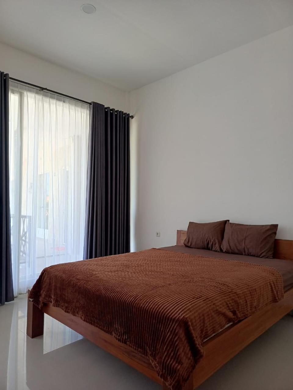 Zavana Rooms & Restaurant Tanjungkarang Exterior foto